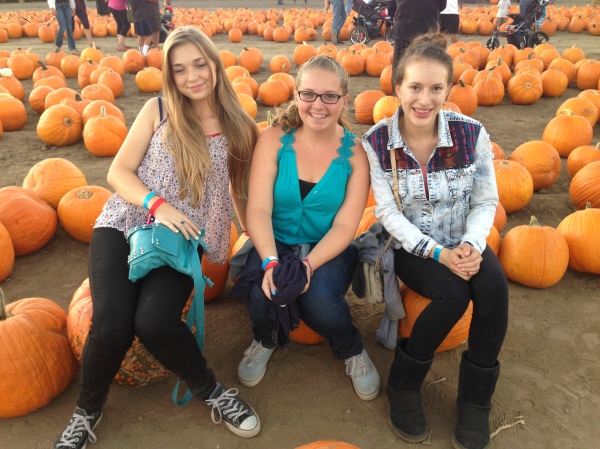 A few of our students enjoying the pumpkin patch.